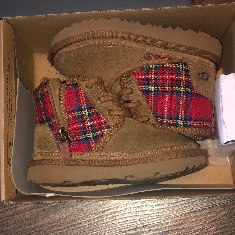 These are toddler boy ugg boots in tan/ corduroy.